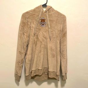 Tan “Do Nothing Club” fleece hoodie with teddy bear embroidery on the front